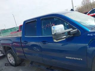 2019 GMC Sierra 1500 SLE z VIN 2GTV2MEC5K1102900, wystawiony jako IAAI lot #41996612 z przebiegiem 69 502 mil mil oraz . Historia ofert i sprzedaży dostępna na DreamBid. Obrazek 14.