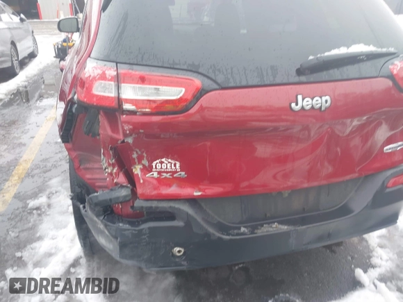 2014 Jeep Cherokee Latitude with VIN 1C4PJMCB8EW166853, listed as a IAAI auction lot 41579386 with 251,683 mi miles and . Bid and sale history available at DreamBid. Image 17.
