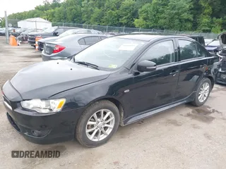 2015 Mitsubishi Lancer ES z VIN JA32U2FU9FU002350, wystawiony jako IAAI lot #40054160 z przebiegiem 120 980 mil mil oraz . Historia ofert i sprzedaży dostępna na DreamBid. Obrazek 2.