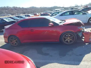2016 Scion tC with VIN JTKJF5C77GJ026150, listed as a IAAI auction lot 41424088 with 96,370 mi miles. Bid and sale history available at carsss.com. Image 13.