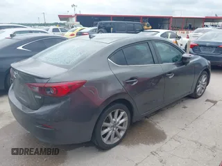 2017 Mazda 3 Touring with VIN 3MZBN1V74HM121397, listed as a IAAI auction lot 42143495 with 194,122 mi miles and . Bid and sale history available at DreamBid. Image 4.