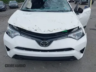 2018 Toyota RAV4 LE with VIN JTMBFREV6JJ210226, listed as a IAAI auction lot 42700312 with Not provided miles and . Bid and sale history available at DreamBid. Image 6.