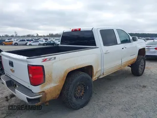 2017 Chevrolet Silverado 1500 LT with VIN 3GCUKREC7HG100199, listed as a IAAI auction lot 41542046 with 224,692 mi miles and . Bid and sale history available at DreamBid. Image 6.