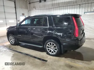 2015 GMC Yukon SLE with VIN 1GKS2AKC3FR664740, listed as a Copart auction lot 53824145 with 194,655 mi miles and Salvage Title. Bid and sale history available at carsss.com. Image 2.