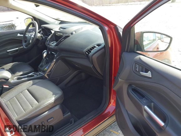 2016 Ford Escape Titanium with VIN 1FMCU9JX9GUA16892, listed as a IAAI auction lot 42110986 with 87,775 mi miles and . Bid and sale history available at DreamBid. Image 5.