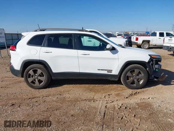 2016 Jeep Cherokee Latitude z VIN 1C4PJMCS0GW277030, wystawiony jako IAAI lot #40807423 z przebiegiem 189 503 mil mil oraz . Historia ofert i sprzedaży dostępna na DreamBid. Obrazek 13.