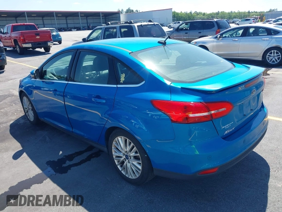 2015 Ford Focus Titanium with VIN 1FADP3J24FL322247, listed as a IAAI auction lot 41998030 with 151,341 mi miles and . Bid and sale history available at carsss.com. Image 3.