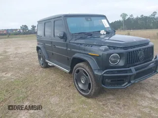 2023 Mercedes-Benz G with VIN W1NYC7HJ4PX477038, listed as a IAAI auction lot 41027476 with 2,324 mi miles. Bid and sale history available at carsss.com. Image 1.