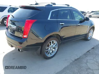 2013 Cadillac SRX Performance Collection with VIN 3GYFNHE35DS548632, listed as a IAAI auction lot 41990670 with 98,659 mi miles. Bid and sale history available at carsss.com. Image 4.