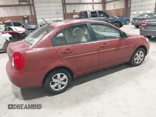 2009 Hyundai Accent Auto GLS with VIN KMHCN46C89U306436, listed as a IAAI auction lot 42010992 with 70,998 mi miles. Bid and sale history available at carsss.com. Image 4.