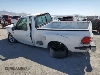 2002 Ford F-150 XL with VIN 1FTRF07L62KD27855, listed as a Copart auction lot 60939935 with Not provided miles and Salvage title. Bid and sale history available at DreamBid. Image 2.