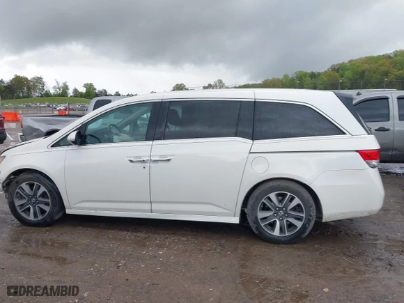 2015 Honda Odyssey Touring Elite with VIN 5FNRL5H98FB076428, listed as a IAAI auction lot 41998339 with 114,573 mi miles. Bid and sale history available at carsss.com. Image 14.