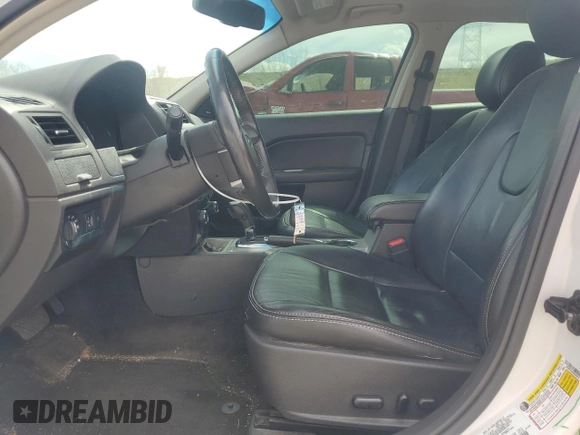 2012 Ford Fusion SEL z VIN 3FAHP0JAXCR282521, wystawiony jako Copart lot #53115505 z przebiegiem 96 833 mil mil oraz Szkoda całkowita • Salvage title. Historia ofert i sprzedaży dostępna na DreamBid. Obrazek 7.