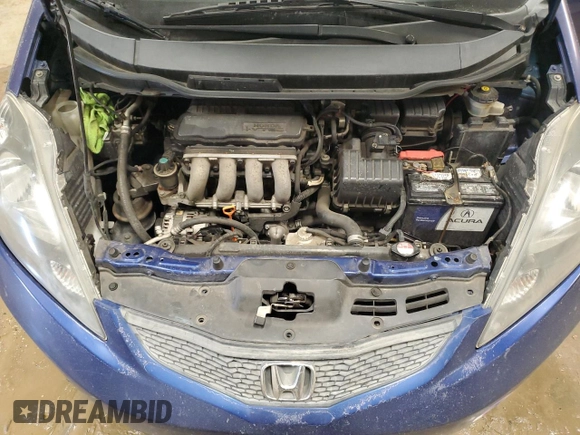 2009 Honda Fit with VIN JHMGE88229S044859, listed as a Copart auction lot 52742495 with 398,726 mi miles and Salvage Title. Bid and sale history available at carsss.com. Image 11.