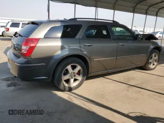 2008 Dodge Magnum z VIN 2D8GZ57208H100293, wystawiony jako Copart lot #69345394 z przebiegiem 191 085 mil mil oraz Szkoda całkowita • Salvage title. Historia ofert i sprzedaży dostępna na DreamBid. Obrazek 3.