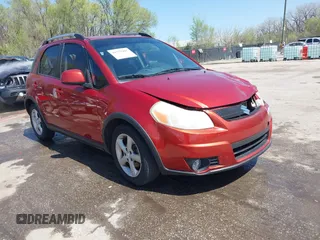 2009 Suzuki SX4 Touring AWD with VIN JS2YB417896200060, listed as a IAAI auction lot 41972405 with 120,352 mi miles and . Bid and sale history available at carsss.com. Image 1.