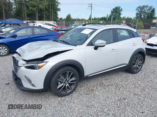 2017 Mazda CX-3 Grand Touring z VIN JM1DKFD70H0159621, wystawiony jako IAAI lot #42331482 z przebiegiem 55 166 mil mil oraz . Historia ofert i sprzedaży dostępna na DreamBid. Obrazek 18.