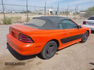 1994 Ford Mustang z VIN 1FALP4440RF192985, wystawiony jako IAAI lot #42234160 z przebiegiem 166 929 mil mil oraz . Historia ofert i sprzedaży dostępna na DreamBid. Obrazek 4.