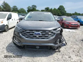 2020 Ford Edge Titanium with VIN 2FMPK3K9XLBB60780, listed as a Copart auction lot 62354735 with 60,328 mi miles and Salvage title. Bid and sale history available at DreamBid. Image 5.