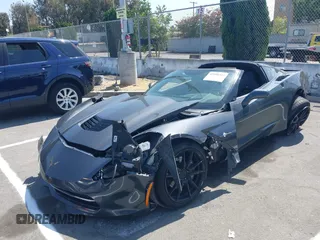 2014 Chevrolet Corvette 2LT with VIN 1G1YD2D75E5120437, listed as a IAAI auction lot 42588343 with Not provided miles and . Bid and sale history available at DreamBid. Image 2.