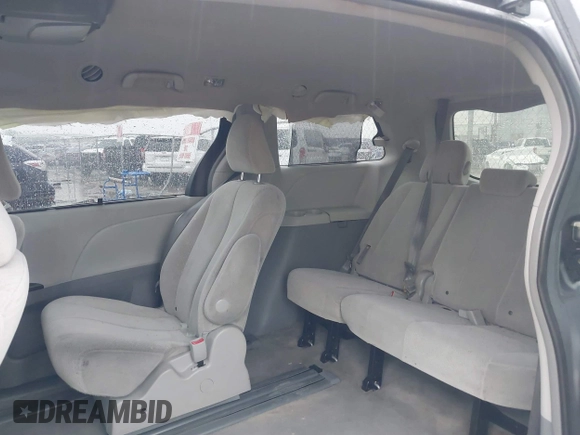 2014 Toyota Sienna LE AAS with VIN 5TDKK3DC9ES501255, listed as a IAAI auction lot 42096386 with 347,364 mi miles and . Bid and sale history available at carsss.com. Image 8.
