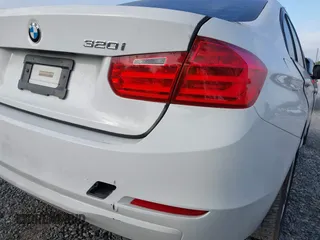 2014 BMW 3 Series 320i with VIN WBA3B1G59ENS78532, listed as a IAAI auction lot 41627172 with 133,049 mi miles. Bid and sale history available at carsss.com. Image 13.