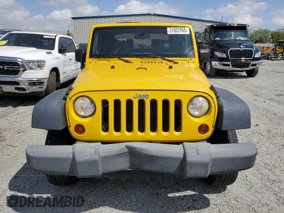 2009 Jeep Wrangler X with VIN 1J4FA241X9L765664, listed as a Copart auction lot 51802065 with 137,053 mi miles and Salvage Title. Bid and sale history available at DreamBid. Image 5.