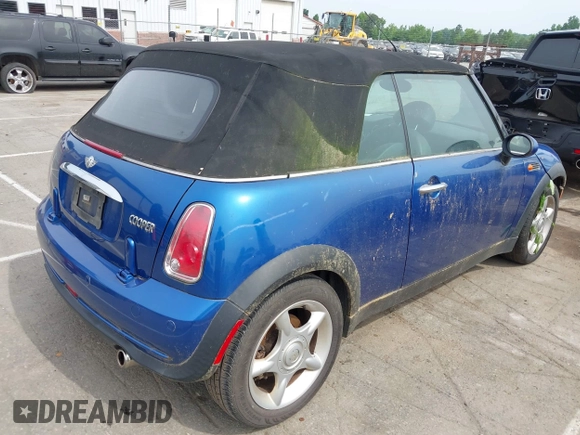 2006 MINI Convertible with VIN WMWRF33566TF65679, listed as a IAAI auction lot 42288864 with 119,884 mi miles and . Bid and sale history available at DreamBid. Image 4.