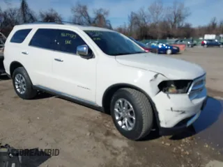 2011 Dodge Durango Citadel with VIN 1D4RE5GG8BC734009, listed as a IAAI auction lot 41677723 with 209,924 mi miles. Bid and sale history available at carsss.com. Image 1.