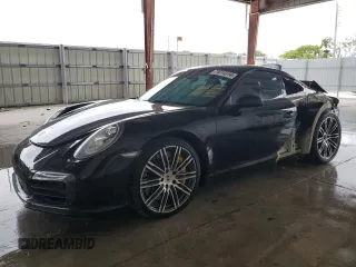 2014 Porsche 911 Turbo with VIN WP0AD2A95ES168052, listed as a Copart auction lot 74014314 with 32,387 mi miles and Salvage Title. Bid and sale history available at carsss.com. Image 1.