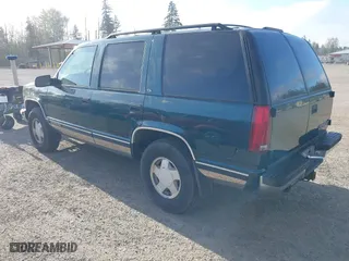 1998 Chevrolet Tahoe with VIN 1GNEK13R9WJ365044, listed as a IAAI auction lot 42042506 with 187,987 mi miles. Bid and sale history available at carsss.com. Image 3.