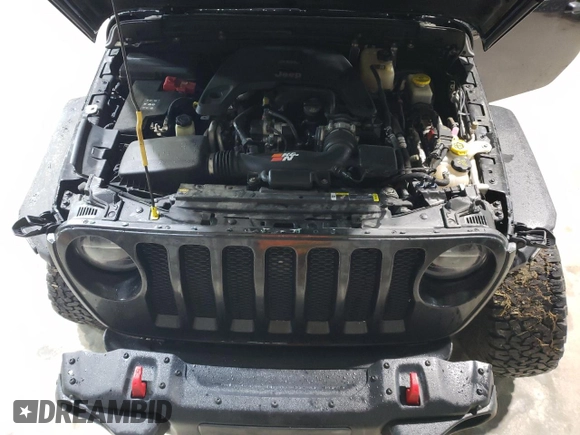 2021 Jeep Wrangler Unlimited Rubicon z VIN 1C4HJXFG7MW651772, wystawiony jako Copart lot #51651685 z przebiegiem 59 351 mil mil oraz Szkoda całkowita • Salvage title. Historia ofert i sprzedaży dostępna na DreamBid. Obrazek 13.