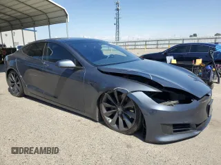 2016 Tesla Model S 90D with VIN 5YJSA1E22GF177120, listed as a Copart auction lot 51972885 with 73,441 mi miles and Salvage title. Bid and sale history available at DreamBid. Image 4.