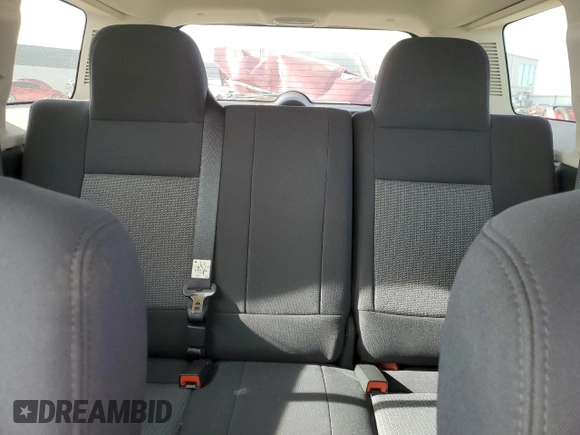 2010 Jeep Patriot Sport with VIN 1J4NF2GB2AD525475, listed as a Copart auction lot 51986785 with 90,659 mi miles and Salvage Title. Bid and sale history available at carsss.com. Image 10.