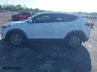 2018 Hyundai Tucson SE with VIN KM8J23A42JU627533, listed as a IAAI auction lot 41880112 with 61,840 mi miles. Bid and sale history available at carsss.com. Image 15.