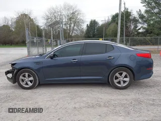 2015 Kia Optima LX z VIN 5XXGM4A79FG441283, wystawiony jako IAAI lot #40834778 z przebiegiem 210 110 mil mil oraz . Historia ofert i sprzedaży dostępna na DreamBid. Obrazek 15.