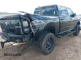 2014 Ram 1500 Sport with VIN 1C6RR7MT6ES233054, listed as a IAAI auction lot 41936407 with 144,759 mi miles and . Bid and sale history available at DreamBid. Image 4.