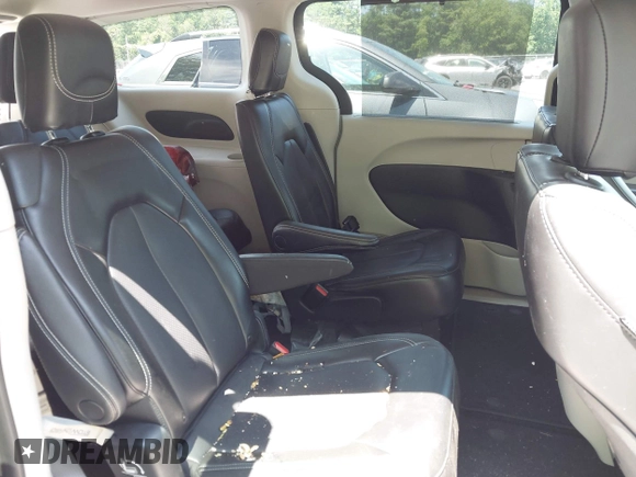 2023 Chrysler Pacifica Touring L with VIN 2C4RC1BG2PR534194, listed as a IAAI auction lot 42613934 with 69,896 mi miles and . Bid and sale history available at DreamBid. Image 8.