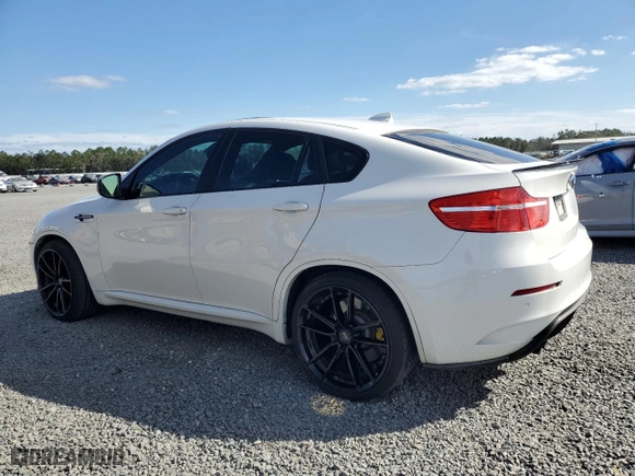 2011 BMW X6 M with VIN 5YMGZ0C55BLK13899, listed as a Copart auction lot 77141774 with 93,316 mi miles and Salvage Title. Bid and sale history available at carsss.com. Image 2.