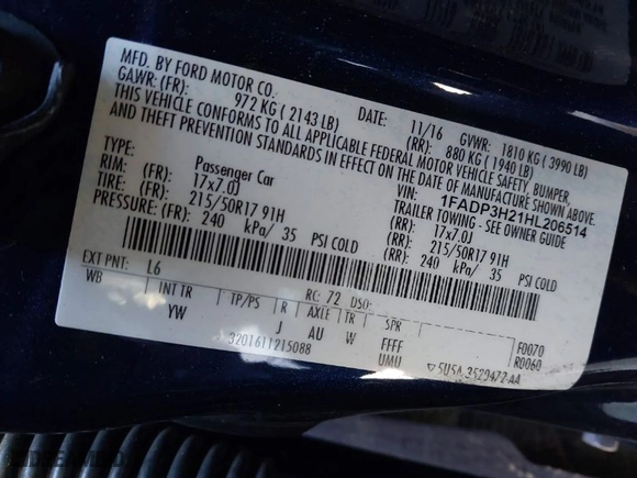 2017 Ford Focus SEL with VIN 1FADP3H21HL206514, listed as a IAAI auction lot 41864635 with 92,102 mi miles. Bid and sale history available at carsss.com. Image 9.