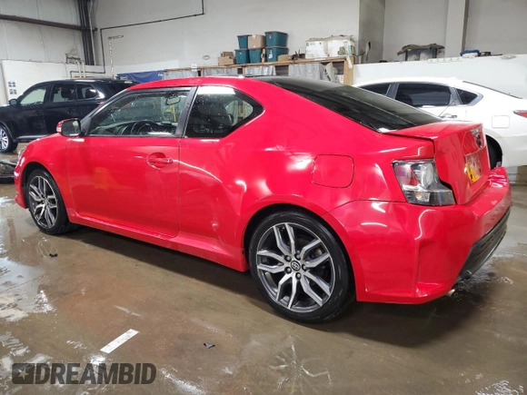 2014 Scion tC z VIN JTKJF5C71E3072025, wystawiony jako Copart lot #51967285 z przebiegiem 187 091 mil mil oraz Szkody całkowita. Historia ofert i sprzedaży dostępna na DreamBid. Obrazek 2.