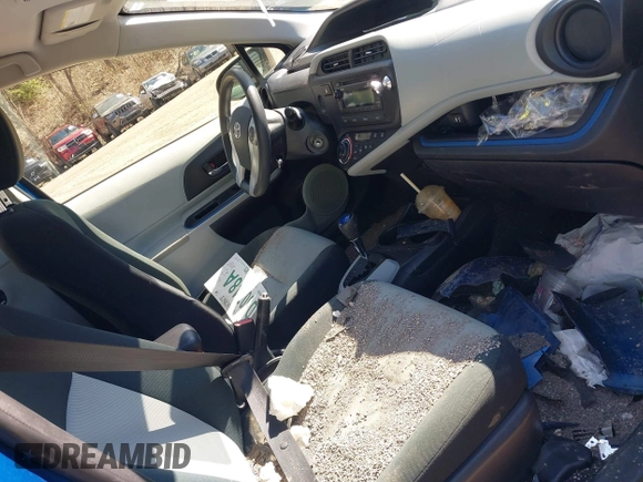 2012 Toyota Prius One z VIN JTDKDTB38C1527448, wystawiony jako IAAI lot #42070550 z przebiegiem Nie podano mil oraz . Historia ofert i sprzedaży dostępna na DreamBid. Obrazek 5.