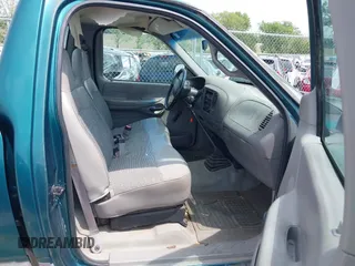 1997 Ford F-150 with VIN 1FTDF1722VNB40056, listed as a IAAI auction lot 42502044 with 155,836 mi miles and . Bid and sale history available at DreamBid. Image 5.