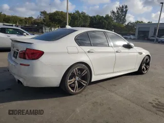 2013 BMW M5 with VIN WBSFV9C56DD096389, listed as a Copart auction lot 44951815 with 123,256 mi miles and Salvage Title. Bid and sale history available at carsss.com. Image 3.
