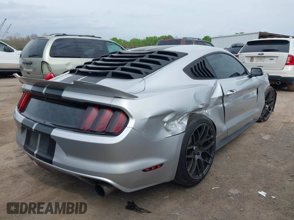 2015 Ford Mustang EcoBoost with VIN 1FA6P8TH9F5373917, listed as a IAAI auction lot 41932118 with 70,541 mi miles and . Bid and sale history available at carsss.com. Image 4.