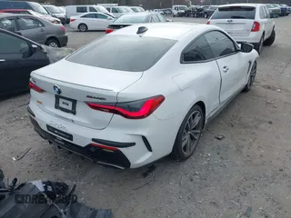 2021 BMW 4 Series M440i xDrive with VIN WBA13AR06MCF78418, listed as a IAAI auction lot 41257716 with 35,974 mi miles and . Bid and sale history available at carsss.com. Image 4.