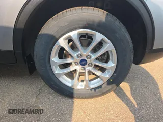 2022 Ford Escape SE z VIN 1FMCU0G61NUB33373, wystawiony jako IAAI lot #42791529 z przebiegiem 56 067 mil mil oraz . Historia ofert i sprzedaży dostępna na DreamBid. Obrazek 25.