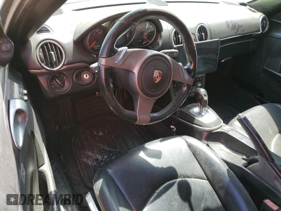 2009 Porsche Boxster z VIN WP0CA29869U710461, wystawiony jako Copart lot #52828635 z przebiegiem 120 385 mil mil oraz Czysty tytuł • Clean title. Historia ofert i sprzedaży dostępna na DreamBid. Obrazek 8.