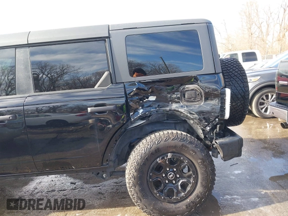2023 Ford Bronco with VIN 1FMEE5DP9PLB82362, listed as a IAAI auction lot 41443809 with 13,567 mi miles and . Bid and sale history available at DreamBid. Image 6.