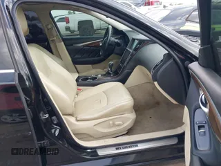 2014 Infiniti Q50 Premium z VIN JN1BV7AP2EM673289, wystawiony jako IAAI lot #42552398 z przebiegiem 172 770 mil mil oraz . Historia ofert i sprzedaży dostępna na DreamBid. Obrazek 5.